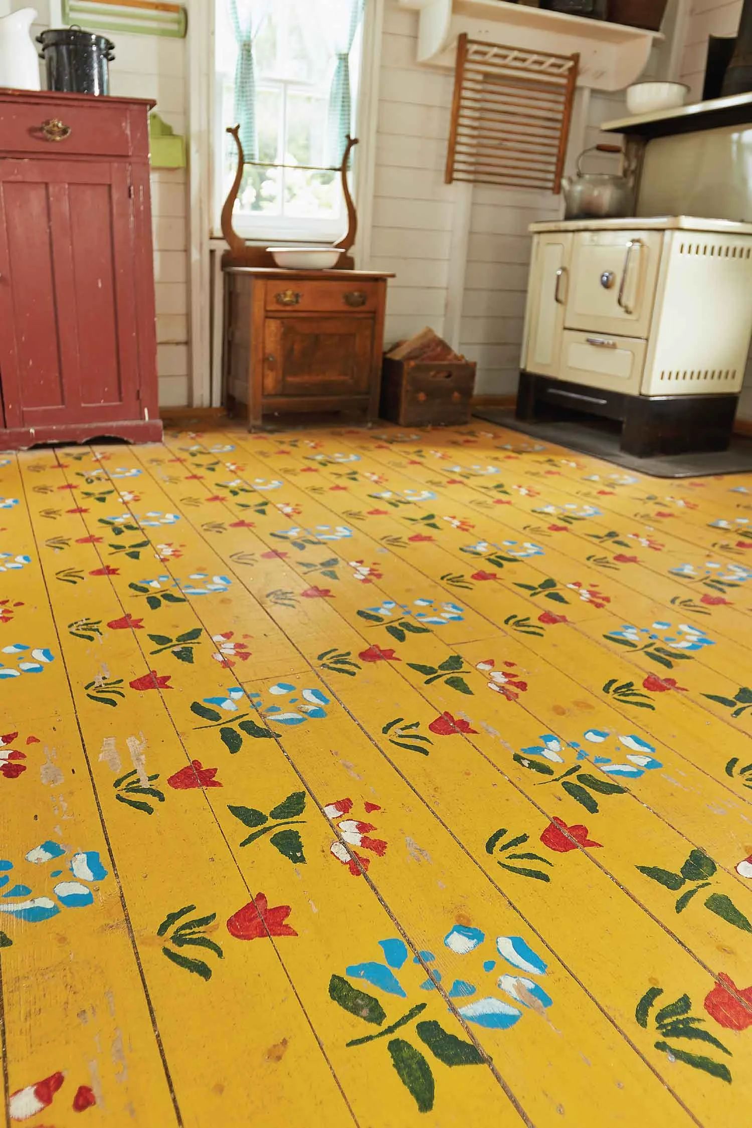 A replica of the Sommerfeld housebarn floor pattern, at the Mennonite Heritage Village, Steinbach, Manitoba, handpainted by M. Krahn, 2010.