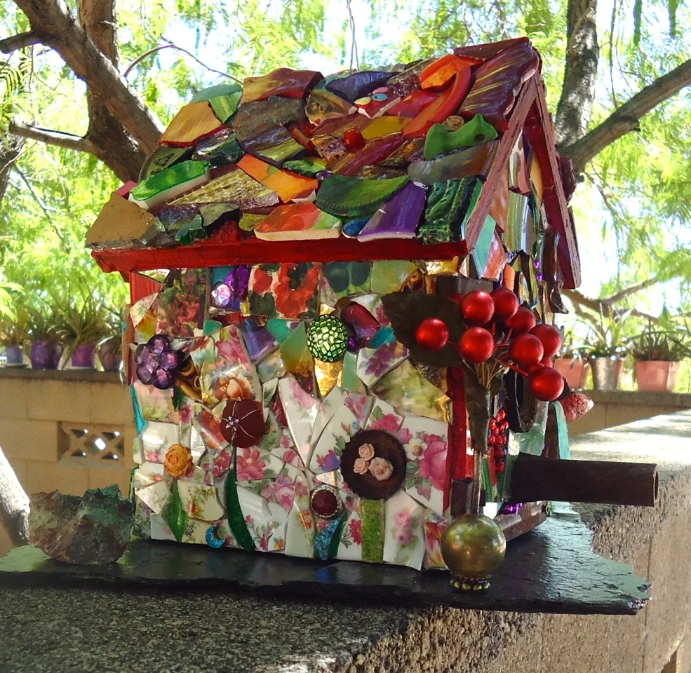 Wildflower Garden with Decorative Rock and Potted Plant.jpeg