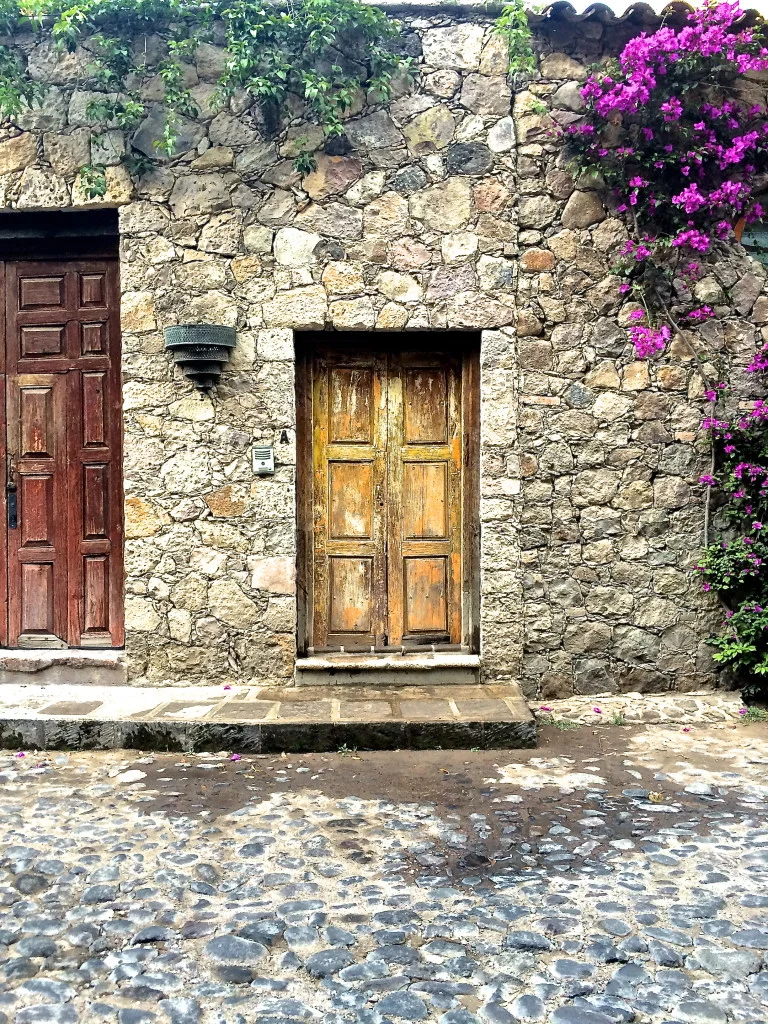Stone, wood, and bouganvillea
