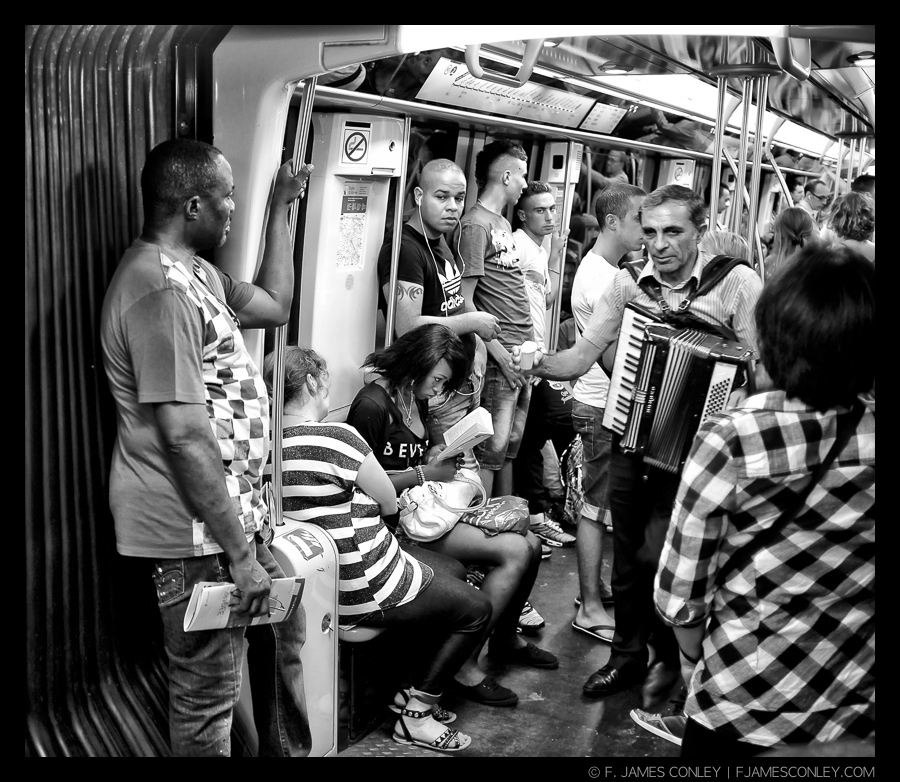 Trying to find a moment to read in the chaos of geometric shapes and the noise of the Paris Metro is a problem of modern life (even if the accordion is kind of quaint).