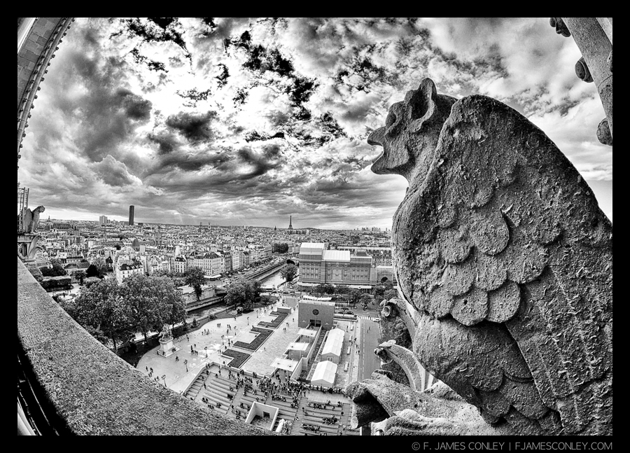 A gargoyle on Notre Dame breathes the clouds into being.