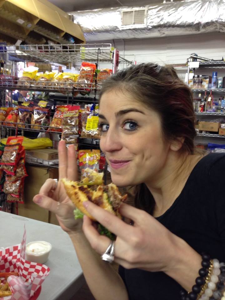 Laura loving her burger from Stanton's!