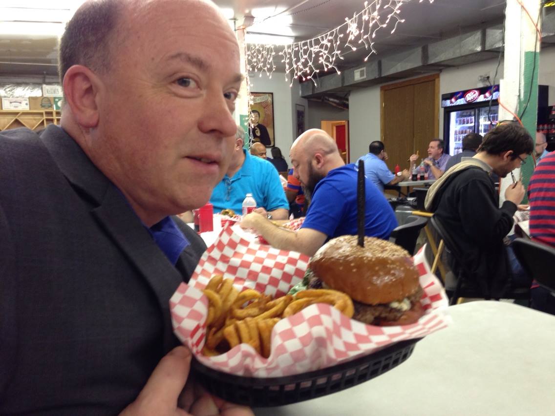 Dave showing off his "burger-masterpiece".