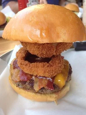 The Lockhart Legend - Tall burger, but short on flavor.