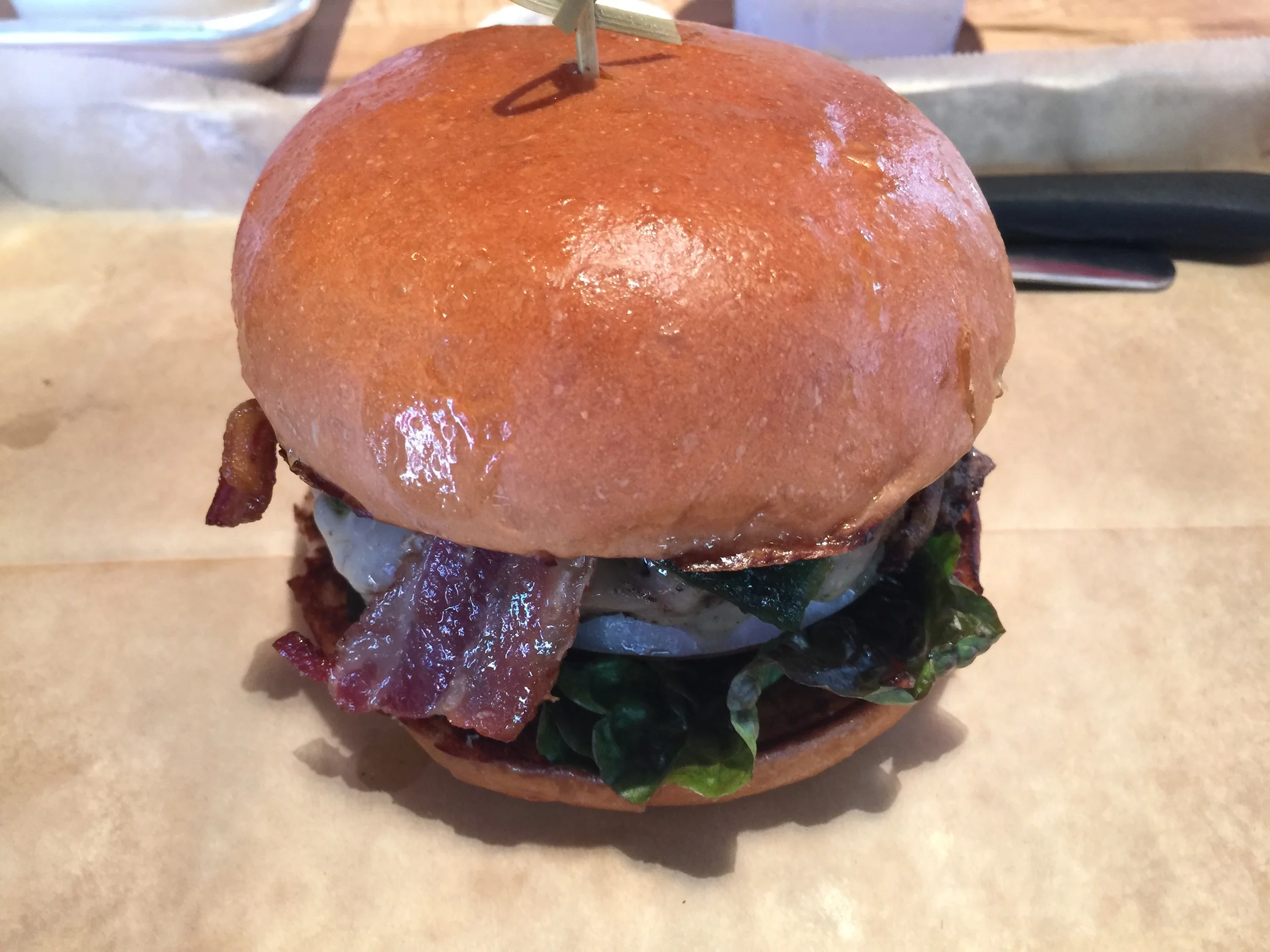 The Llano Poblano Burger is an appetizing value at Hopdoddy Burger Bar just opened in River Oaks District.
