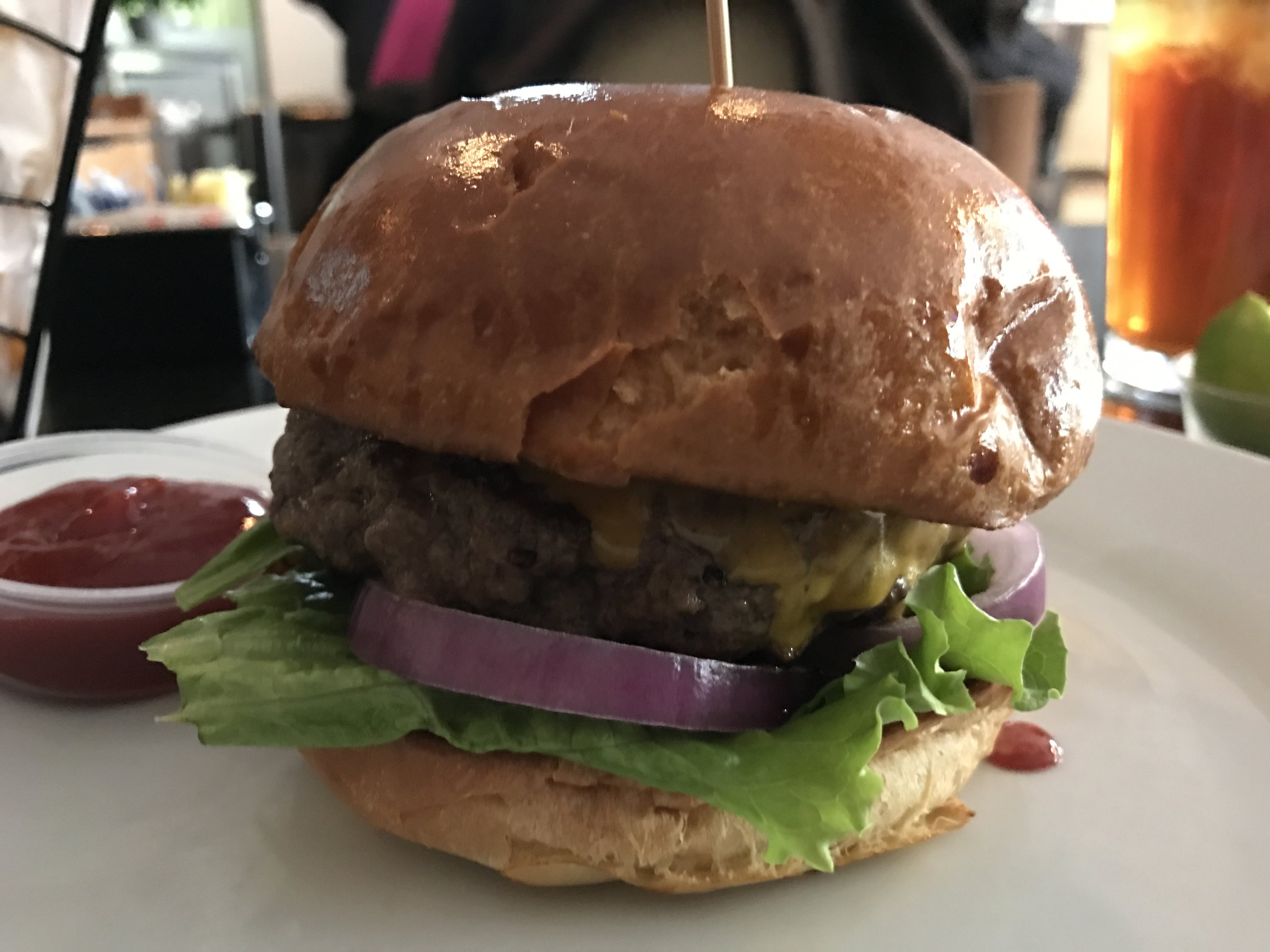 American Classic burger from The Burger Palace in the shadows of The Galleria.
