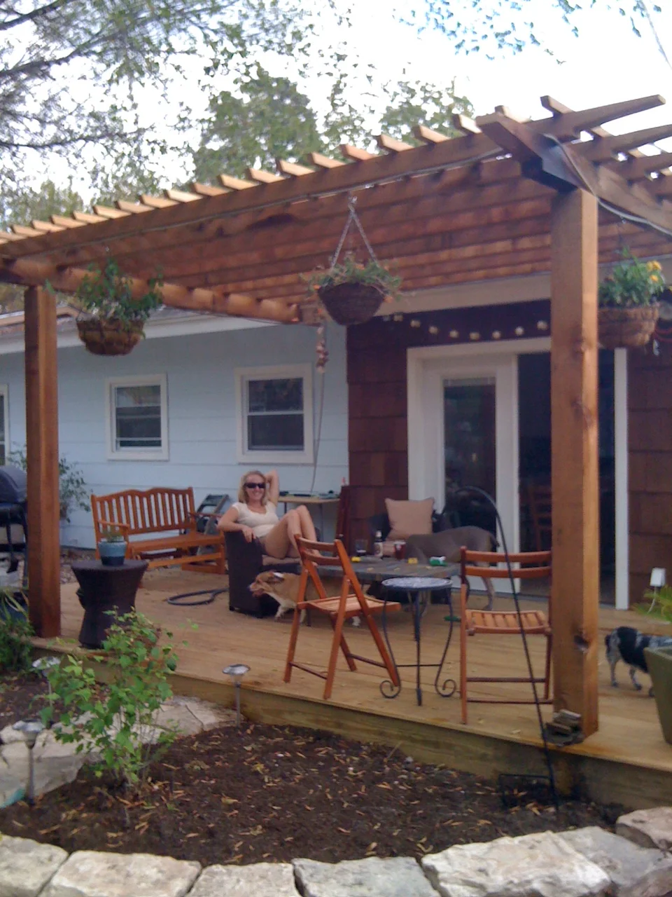  Before - deck and arbor complete, bench railings and further landscaping in progress. 