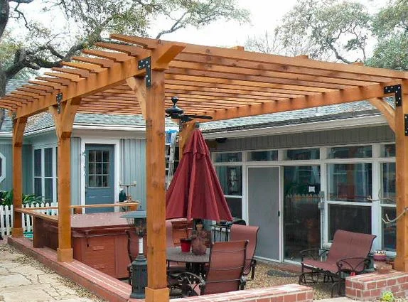  Tarrytown, Austin: Cedar arbor over brick patio, tied to home. A UV blocking sunshade further reduced temperature for this outdoor living space. 