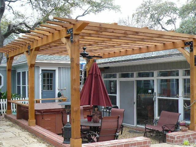  Tarrytown, Austin: Arbor over brick patio, tied into roof with ceiling fan and custom UV sun shade added later. 
