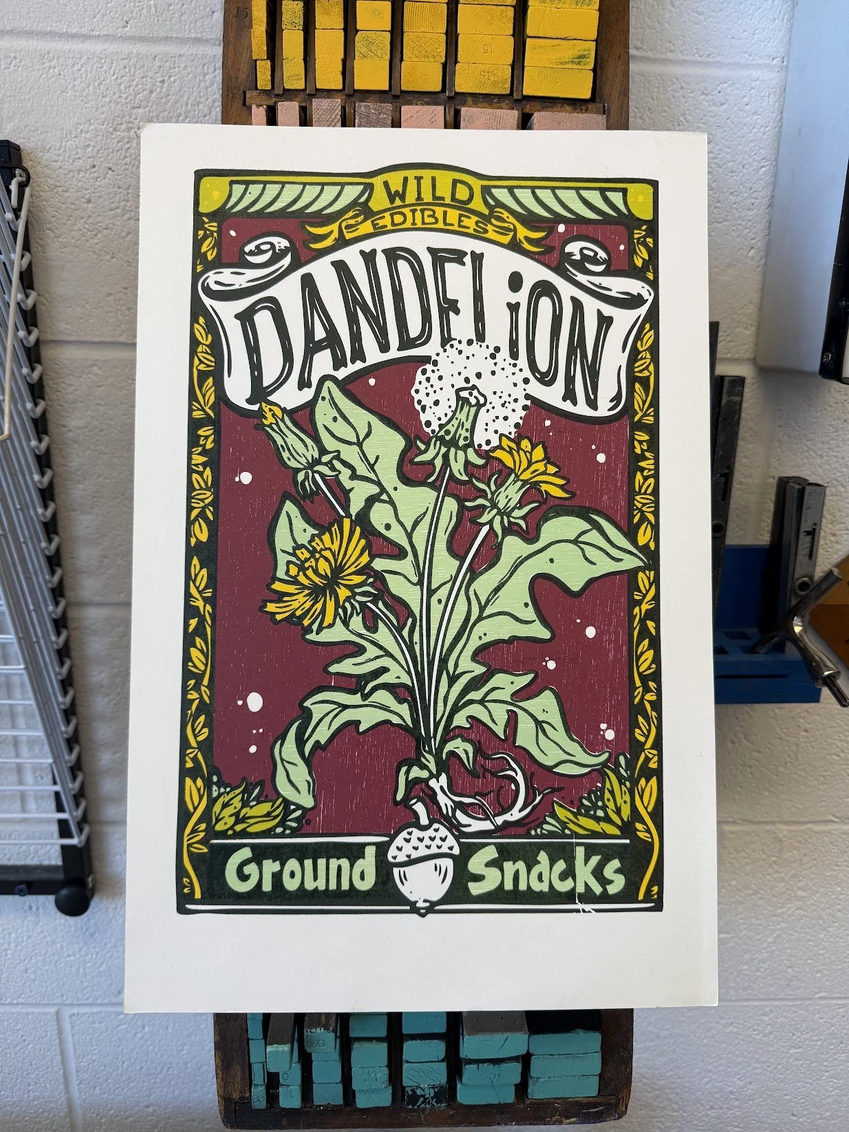 Relief-printed dandelion print designed and printed by hand as part of an ongoing personal printmaking practice.