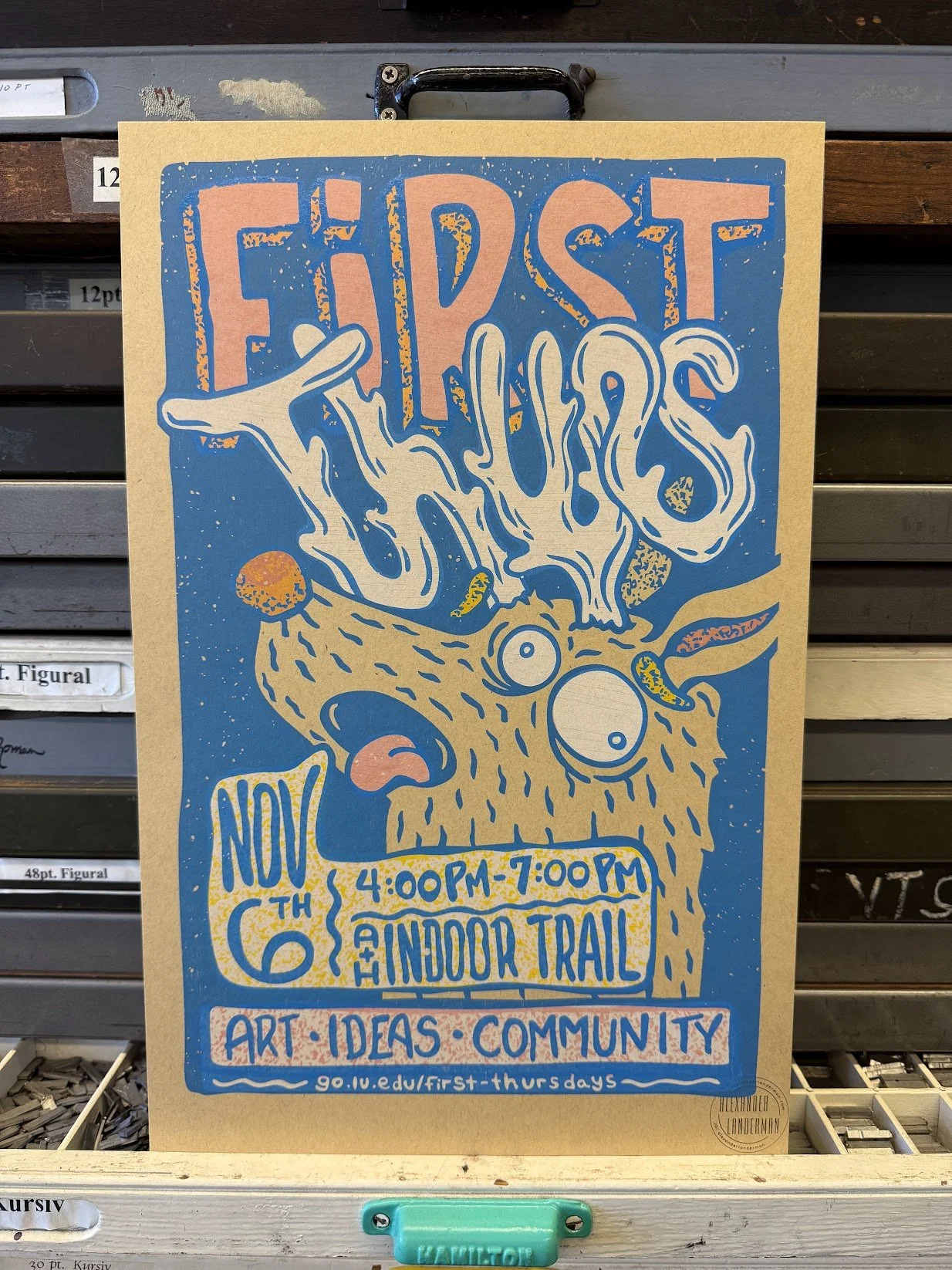 Finished hand-printed First Thursdays poster produced using relief printing methods.