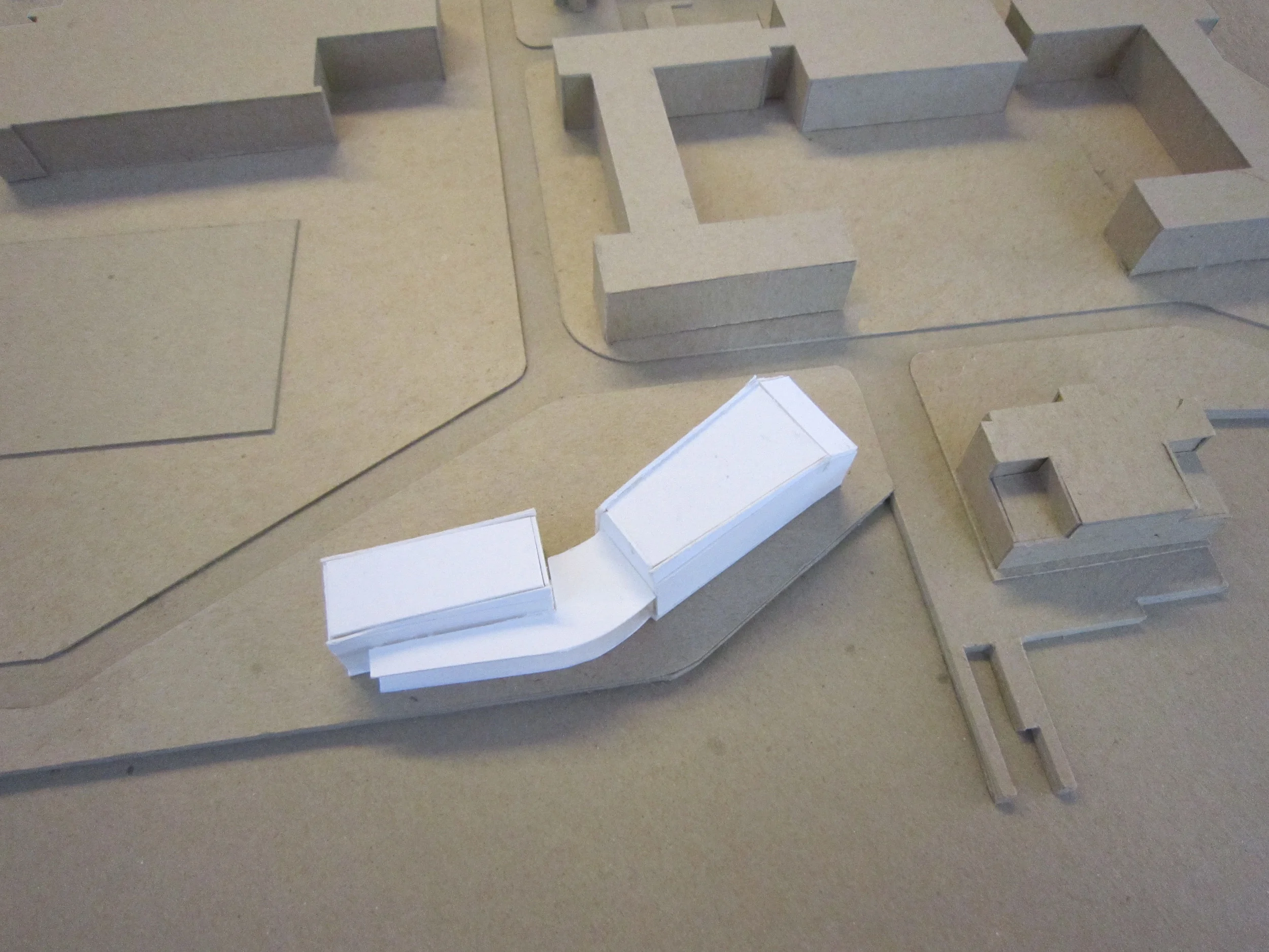 The final building form was roughed out at 1/64" = 1'-0" scale in model form. This simple model became the ongoing reference for the project's design development.