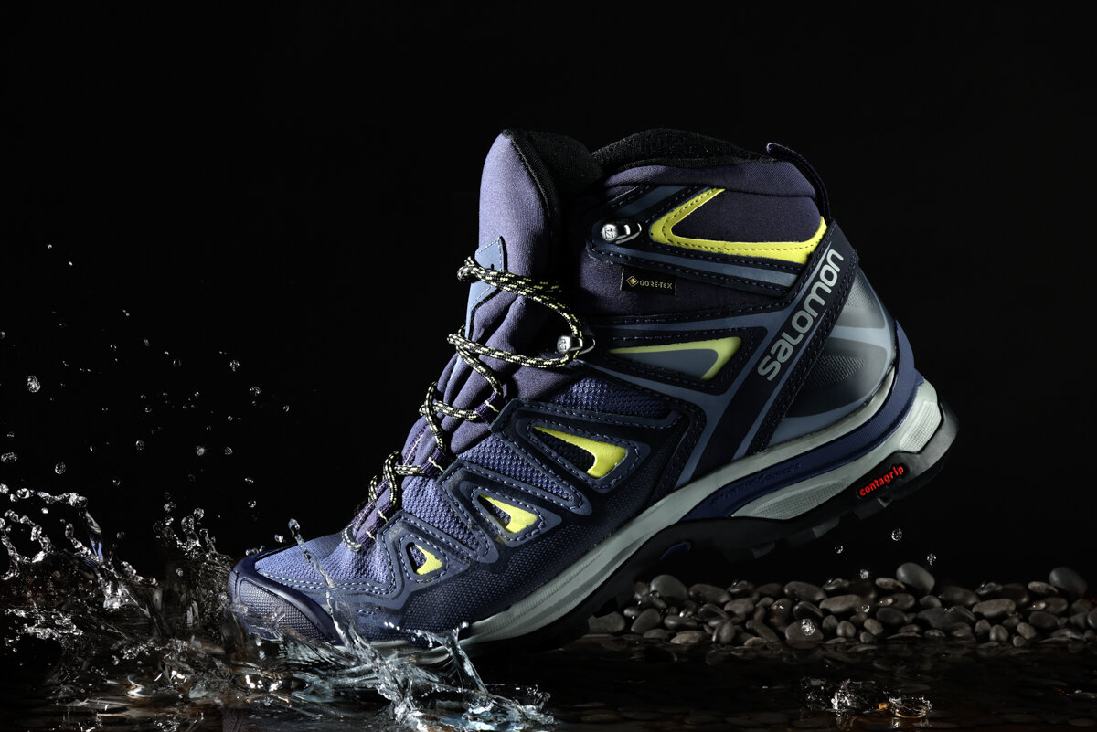 Salomon Hiking Boots stepping in a puddle