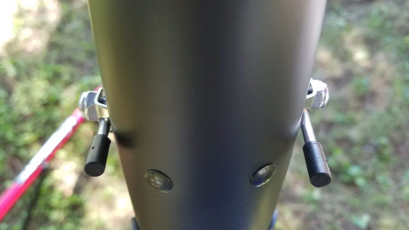 There is a sweet spot with fender-stay bolts where they will clamp just tight enough to hold position while being loose enough for you to slide them by hand. Finding that sweet spot helps fender alignment go faster.