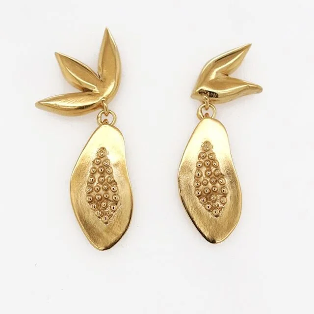 There is a garden in her face
Where roses and white lilies blow
A heavenly paradise is that place
Wherein all pleasant fruits flow

New Summer Collection is out now- featuring the Papaya Earrings- available in Gold and Sterling Silver- shop link in p