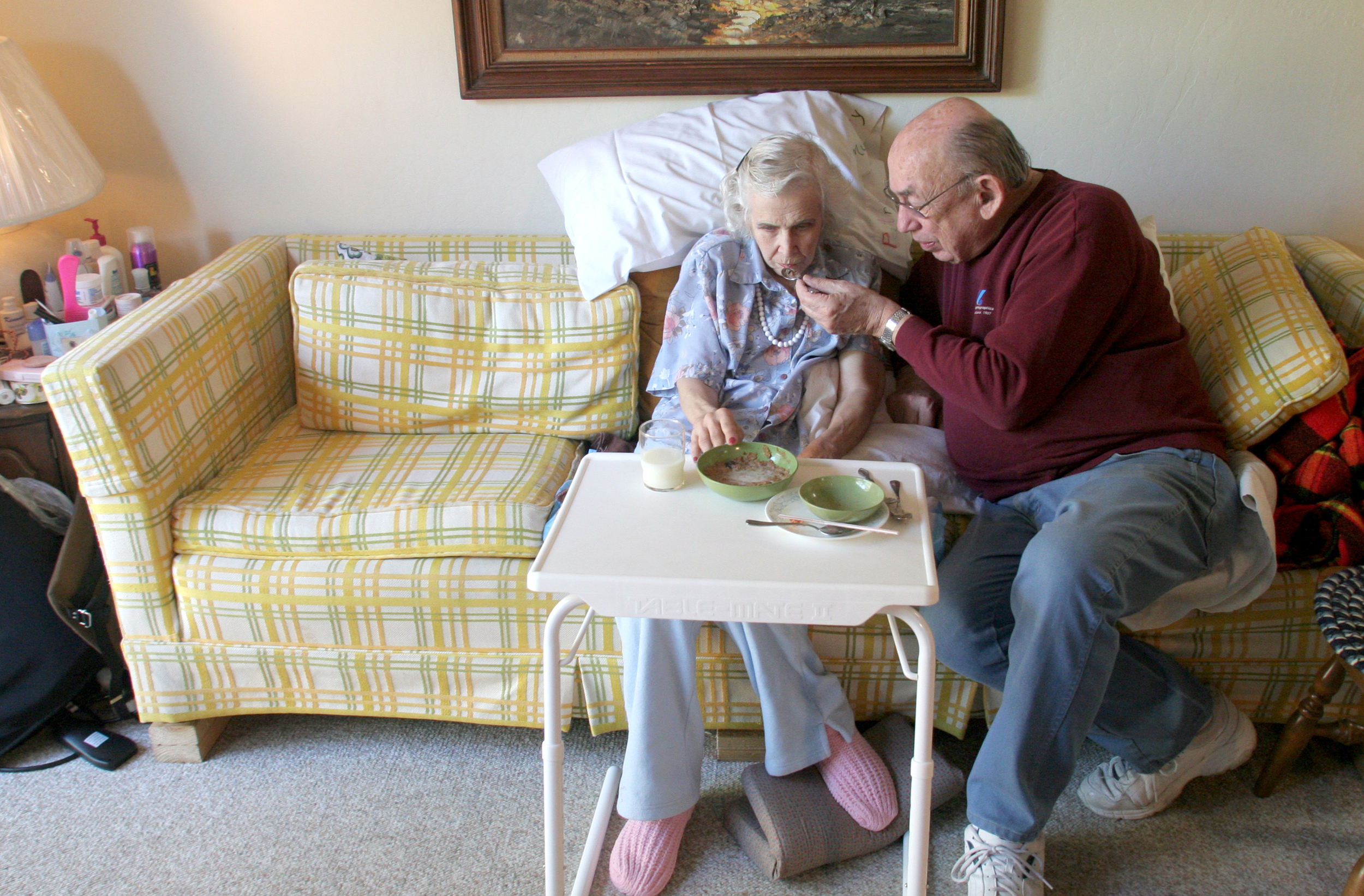  The husband of a hospice patient feeds her at home every day; he has taken to caring for her at home with the help of Hospice of the Valley and will so until she passes how she wished at home how they planned.&nbsp; 
