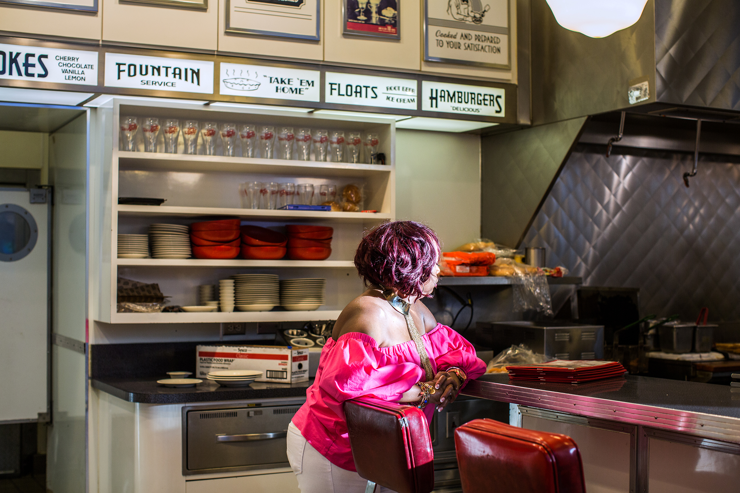  A woman waits for her order at Peggy Sue’s dinner in San Jose, California.  