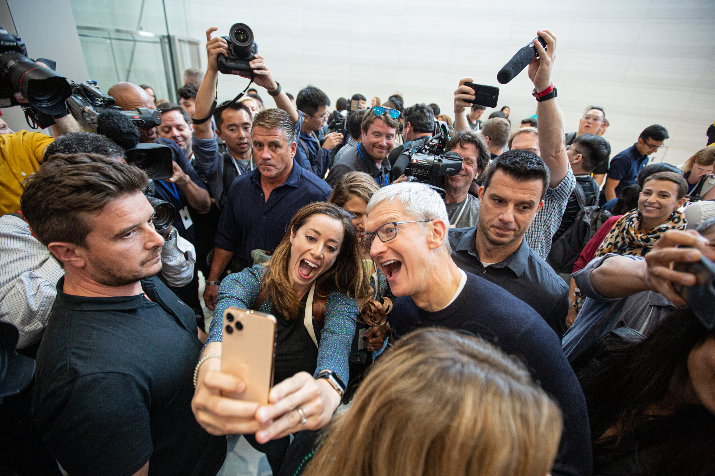  Tim Cook joins the croud at apples 2019 product launch event at its Coupertino heasdquarters. 
