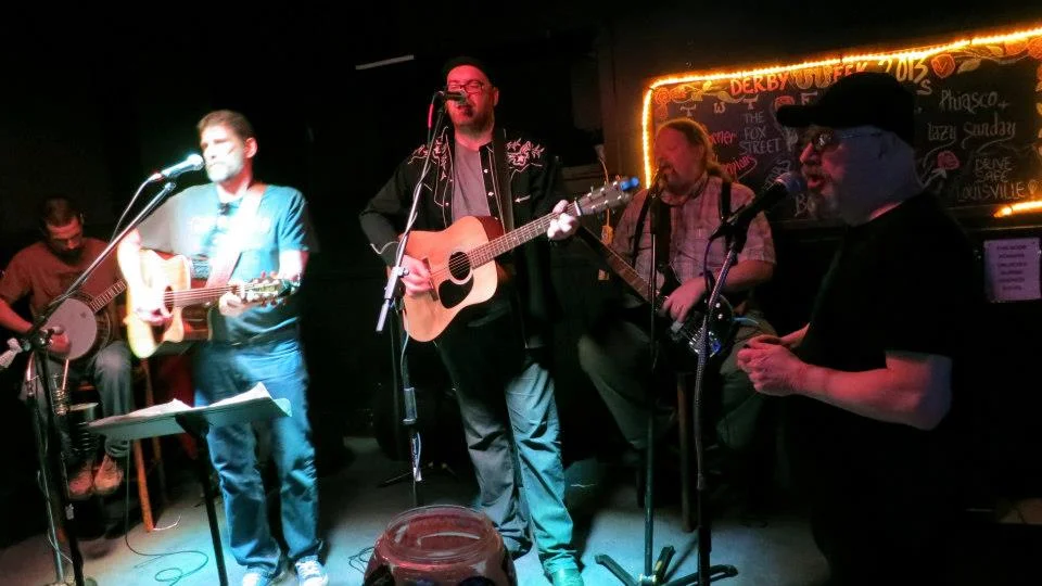 Michael Raymer playing the Harp with Tom Boone and the Back Porch Pickers