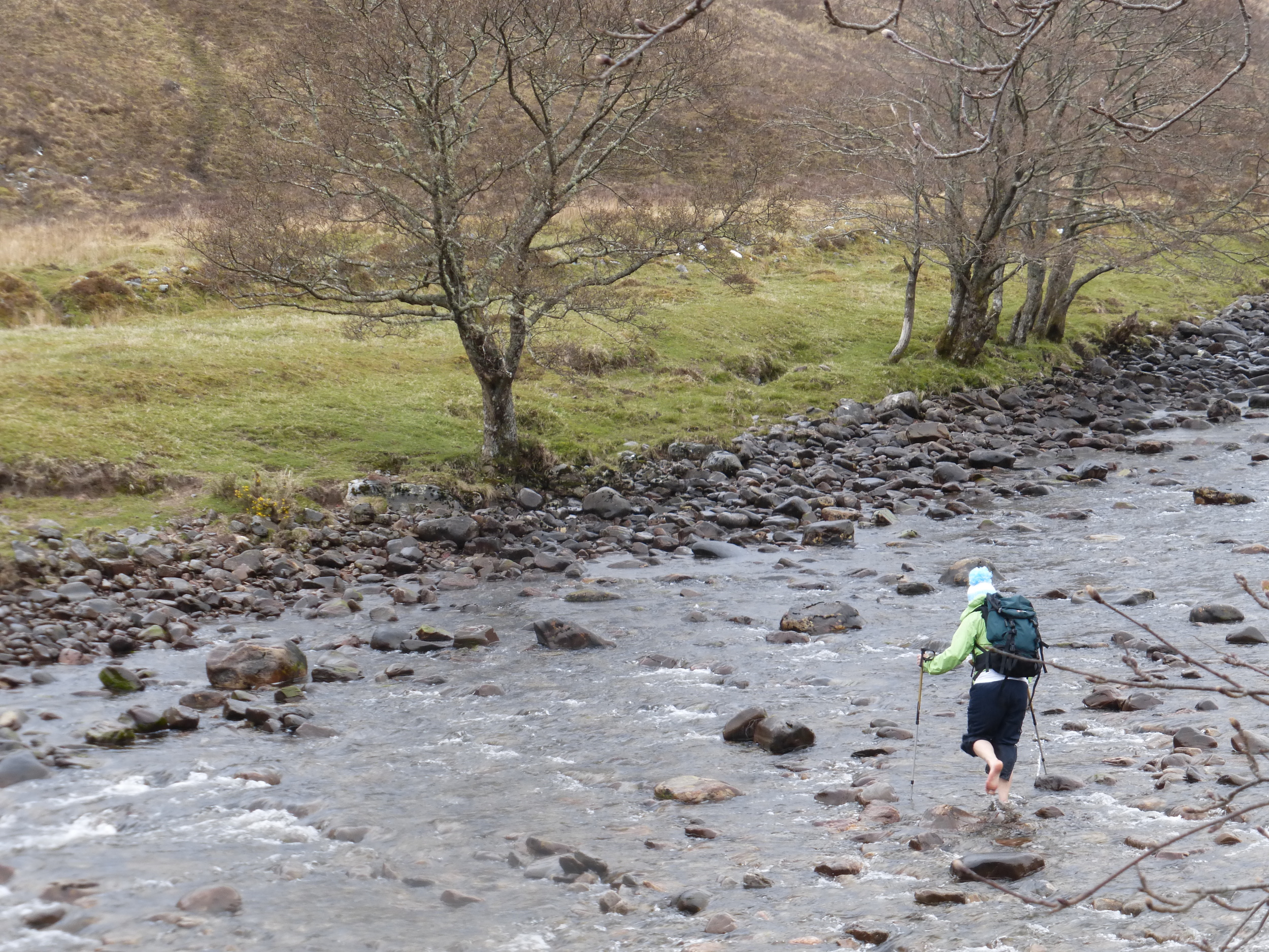 Ellie braves the freezing cold water as she crosses the River Ling