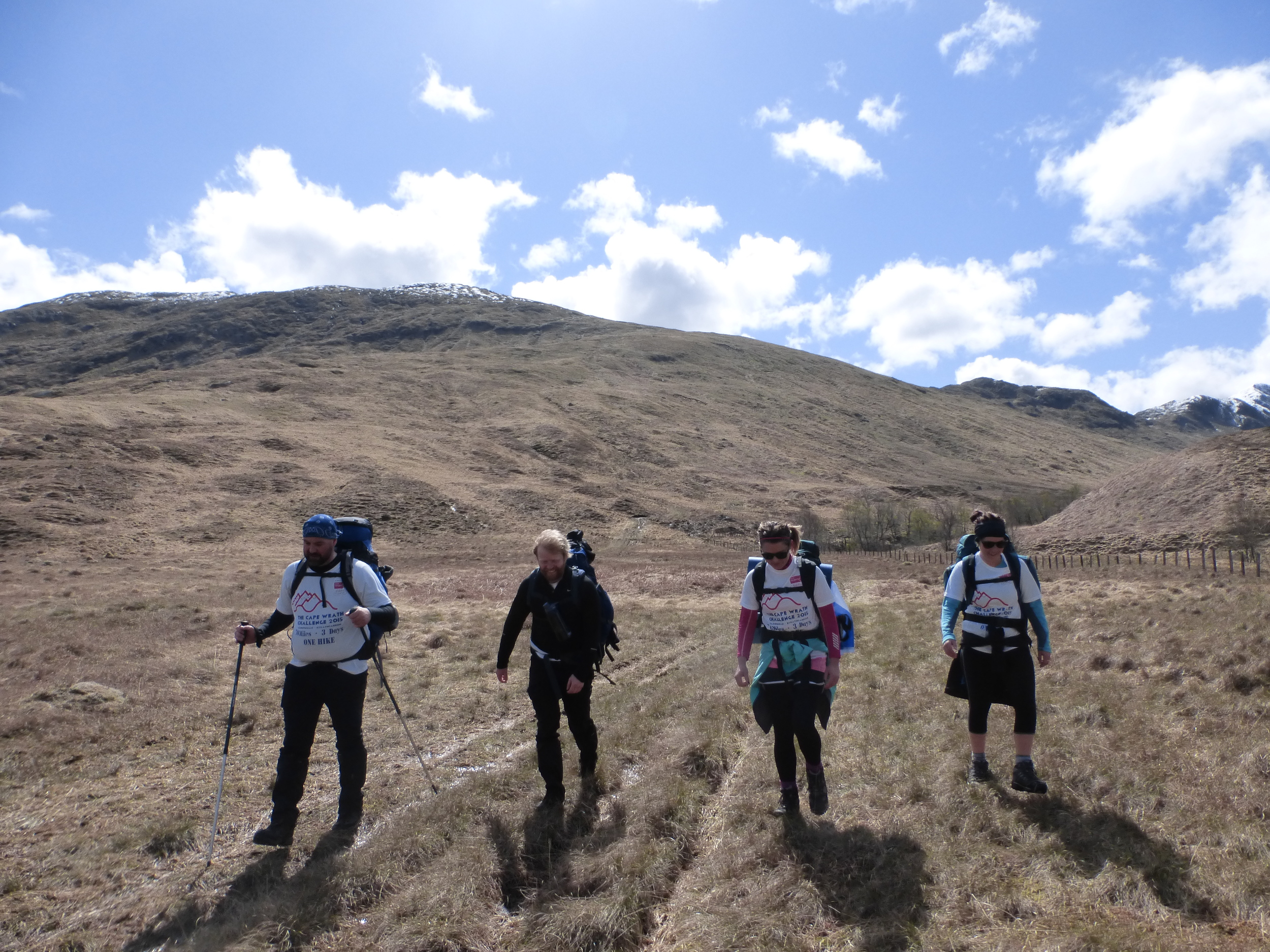 Kenny, Alan and the girls march on towards Strathan