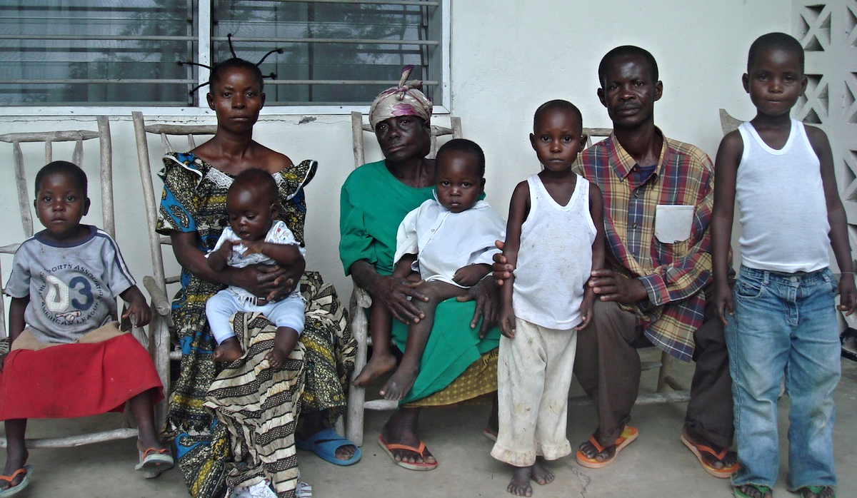 Makolo, his wife, mother and five of the nine children