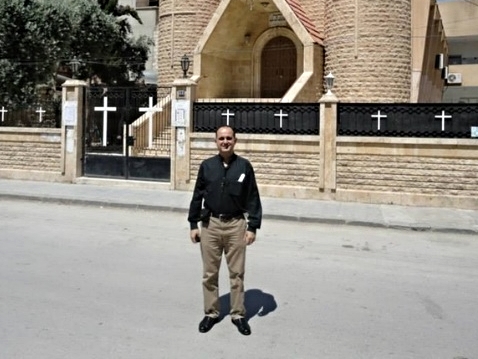 Rev. Salam Hanna, another Presbyterian pastor in Syria, visiting the Church in Hasakeh which was founded and built by Yacoub and Mathild's father