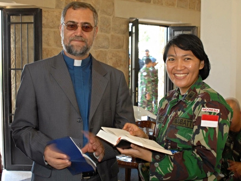 Rev. Fouad Antoun, after worship in Marjayoun, with a UN peacekeeper from Indonesia