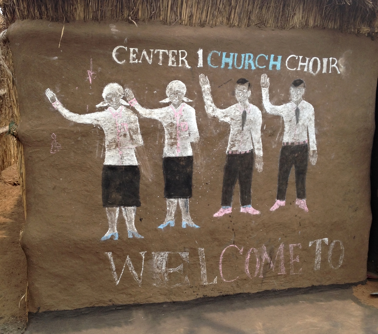 Chalk drawing on youth choir hut in a refugee camp.