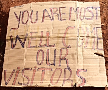 Welcome sign, "You are most welcome our visitors"