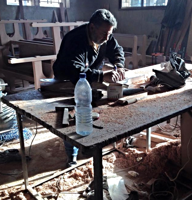 The great modern architect, Le Corbusier, made famous "God is in the details." As the new church takes form around him, this Aleppo craftsman perfects the trim which will finish off the new sanctuary. God is, truly in these details...