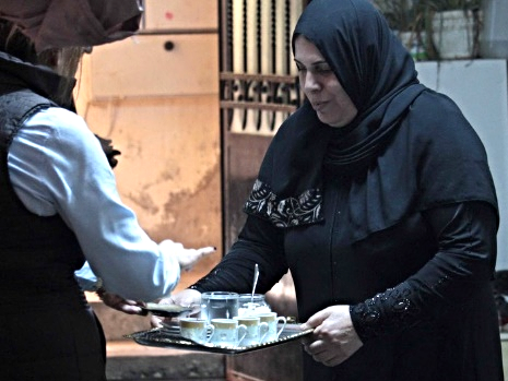 Refugee IDP Appeal Feb 2016 woman with tray.jpg