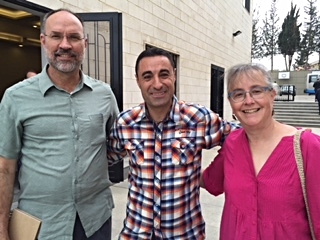 Steve and Julie Burgess with Rabieh church member 