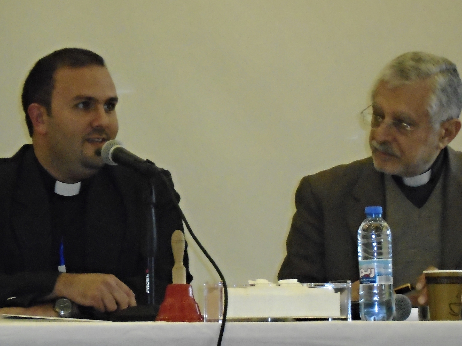 Rev. Mofid Karajieli, pastor of the church in Homs, and Rev. Adeeb Awad, vice moderator of NESSL and today's meeting moderator.