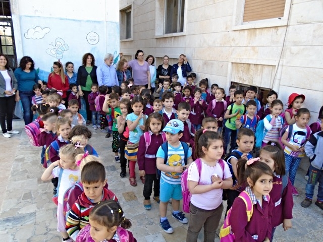 The children, teachers and staff of the Mahardeh kindergarten line up to greet us. The ones on the far right are the five year-olds and they will graduate in May.