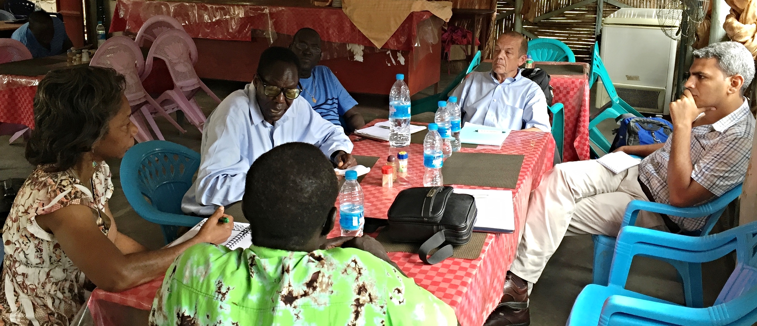 The photo of our group with the Department of Education shows Leisa Wagstaff on the lower left and the Rev. Stephen Nyang at the bottom. Jacob is the one talking. Hany Bareh is at right. The other Hani was taking the picture.