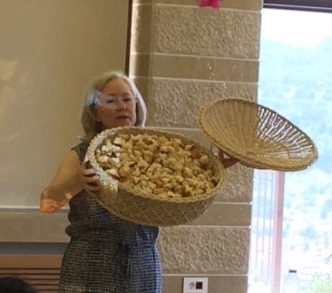 Rev. Nancy Fox and the basket of crumbs