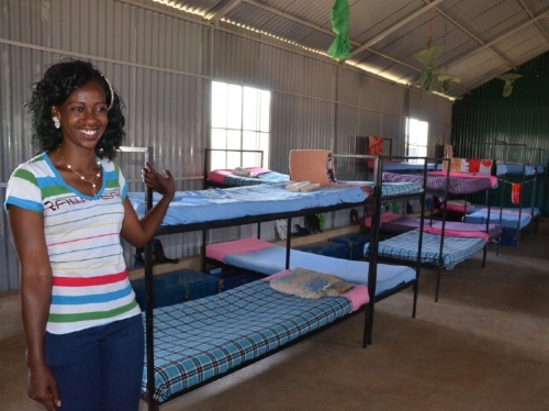 Beatrice, who runs the Center, is like a mother to these girls. She is pictured here in the girls' dormitory