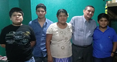 The Herrera Family. Three of their children have left the country to provide for the home.