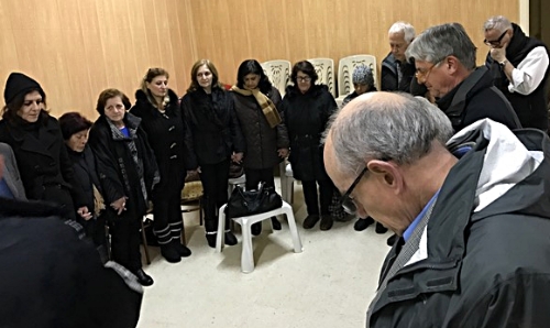  Praying with displaced famiiles in Yazdieh