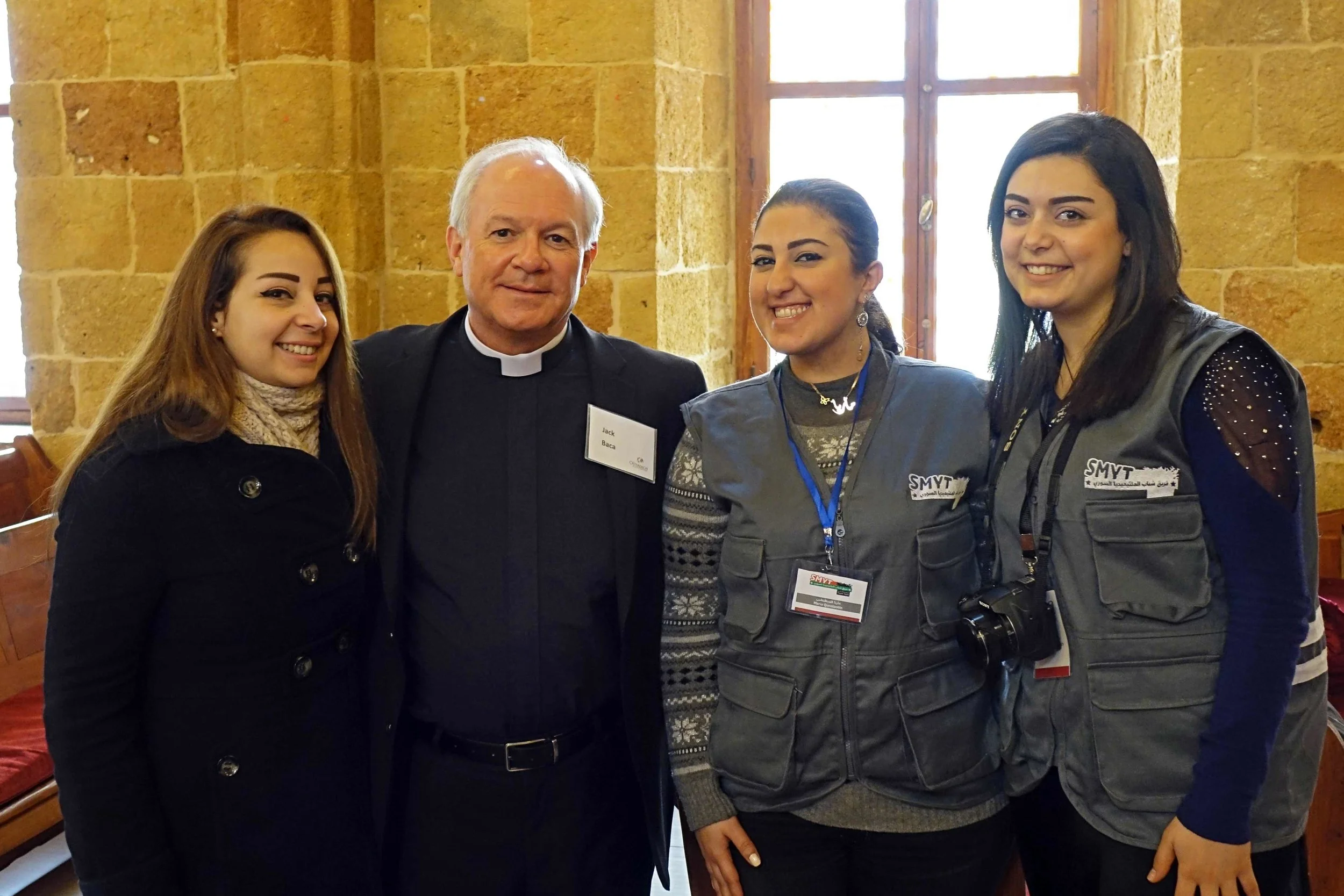 Jack Baca with new Syrian friends at the Latakia Presbyterian Church.
