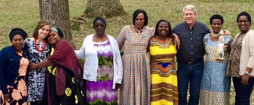 Frank, Heather Evans (second from left, trained counselor who visits Rwanda annually), and the African women from the Trauma Healing session.
