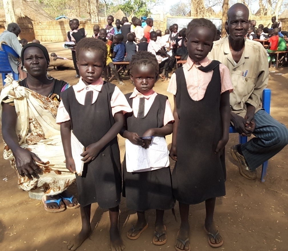 A family impacted by the schools in the refugee camps