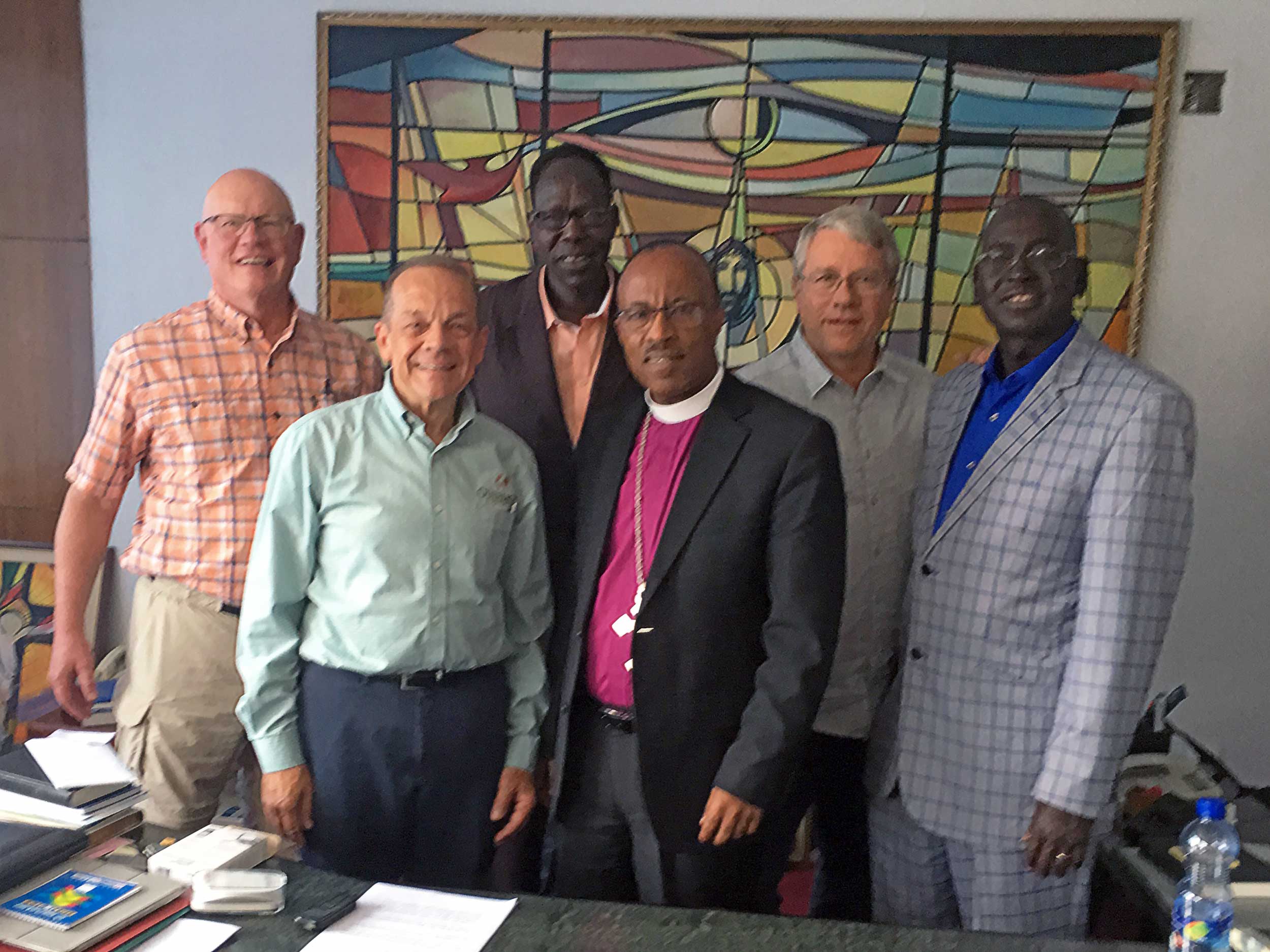 Visit with EECMY President; Left to right: Rev. Alan Grammer, Rev. Jeff Ritchie, Jacob Gatkuoth, Rev. Yonas Yigezu, Frank Dimmock, and David Paduil