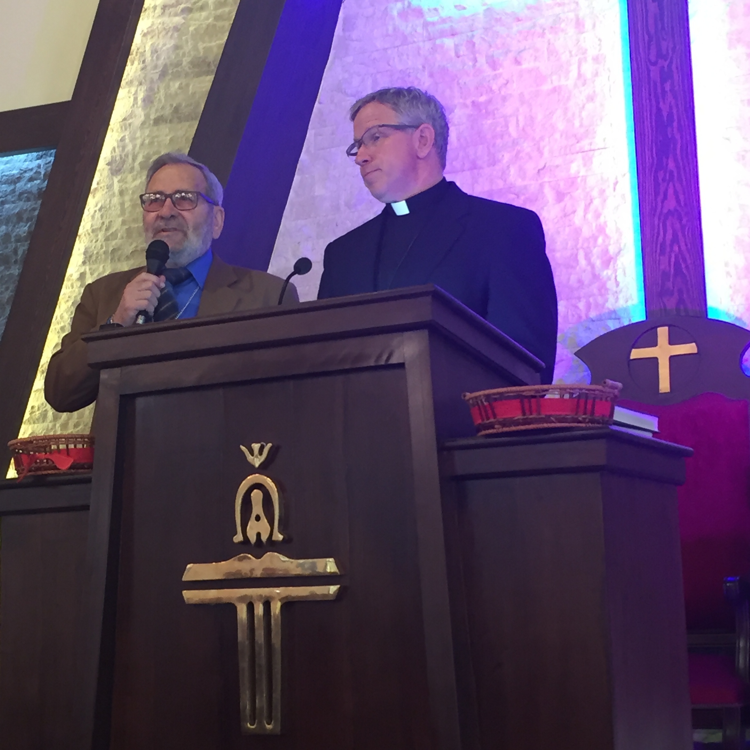 Rev. Tom preaches about Ananias while Rev. Nuhad Tomeh translates.