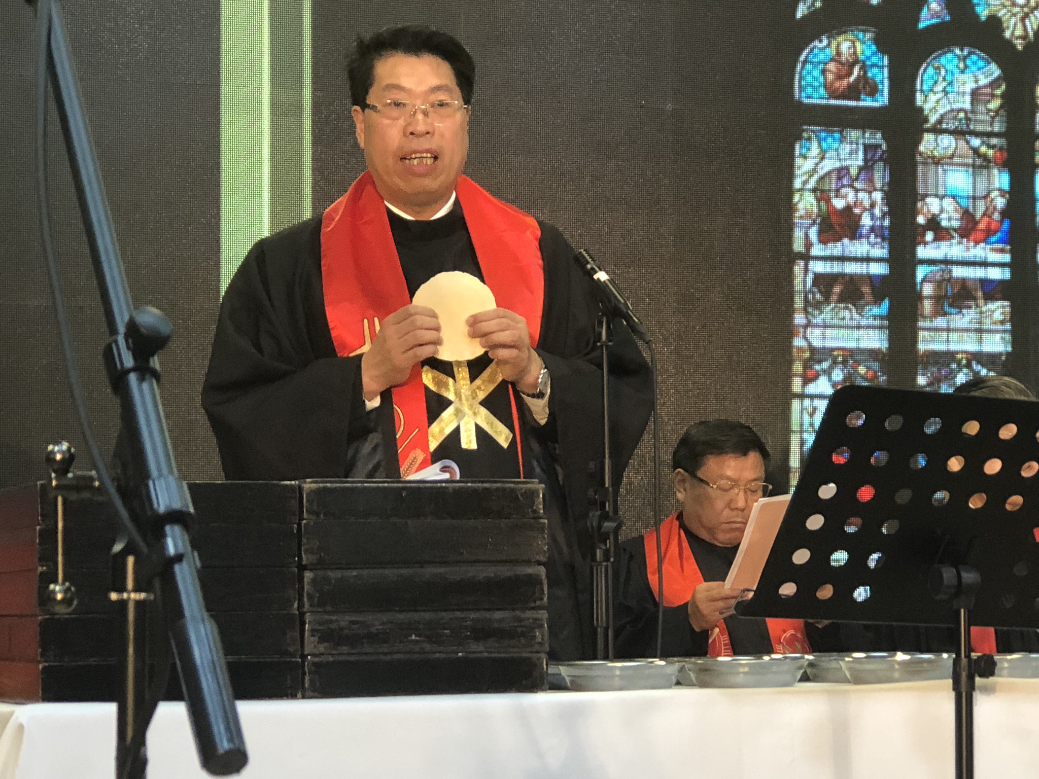  Rev. Zhang, Provincial Chairman, officiating over communion  