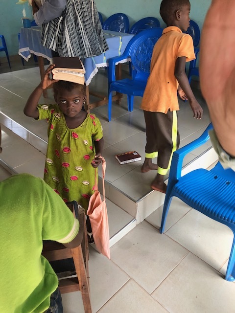  One of the worshipers at Prince of Peace Presbyterian Church in the village of Sakpaula 