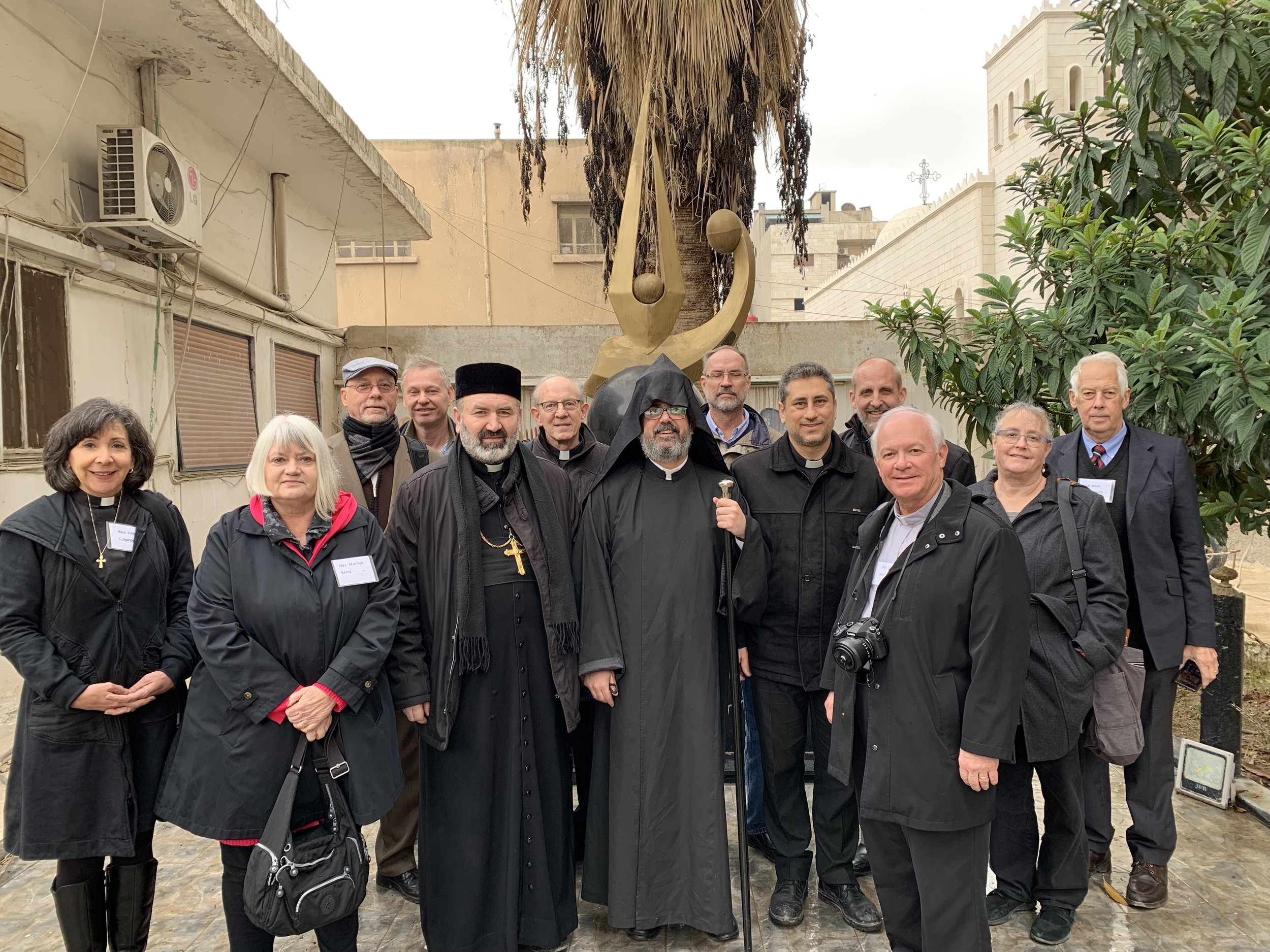  Outreach team with Syrian Orthodox and Armenian Orthodox clergy in front of the Armenian genocide memorial 