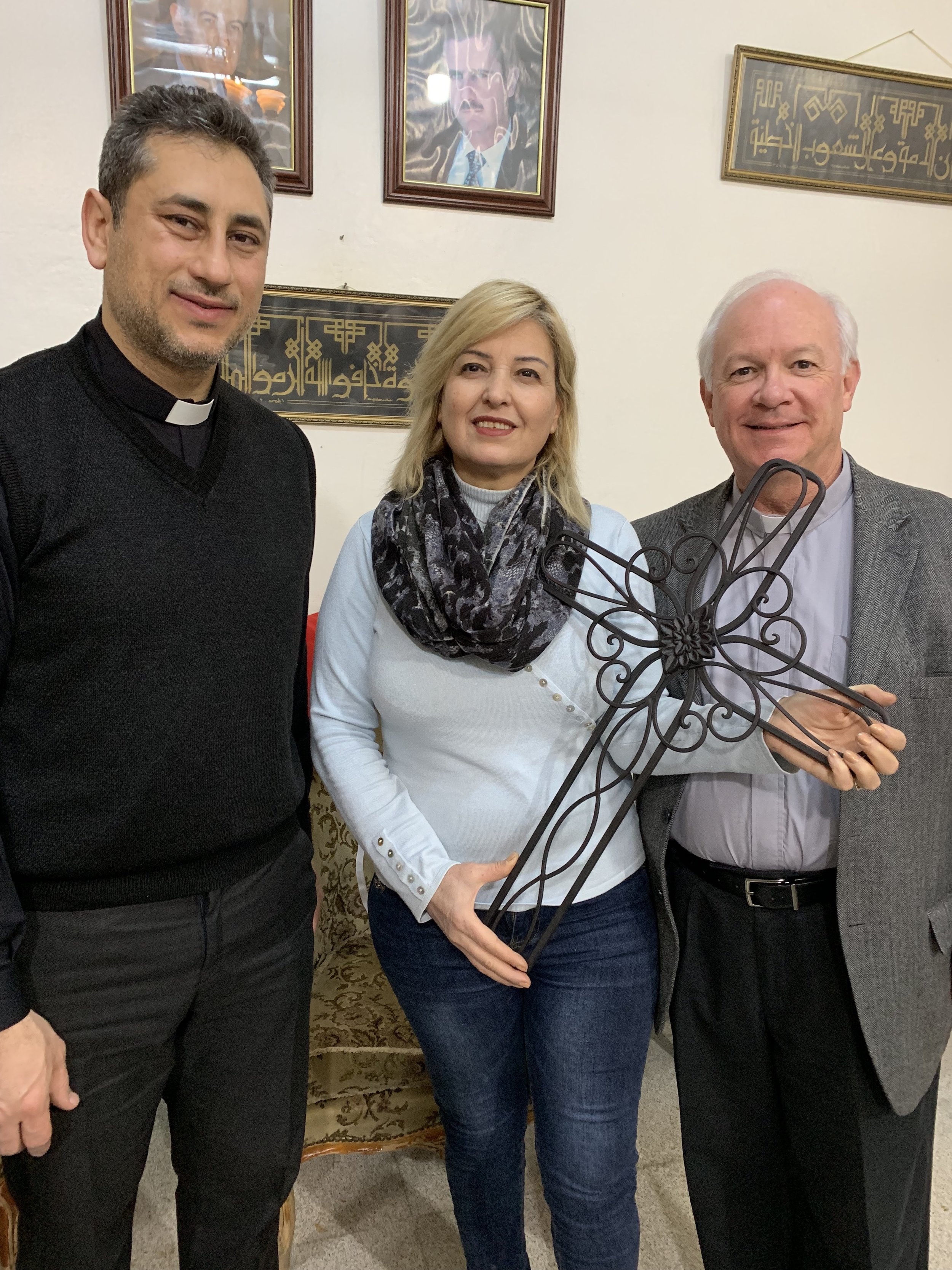  The cross binds us together in unity. Jack leaves a gift with Rev. Firas and church member Bianka in Qamishly before we depart 