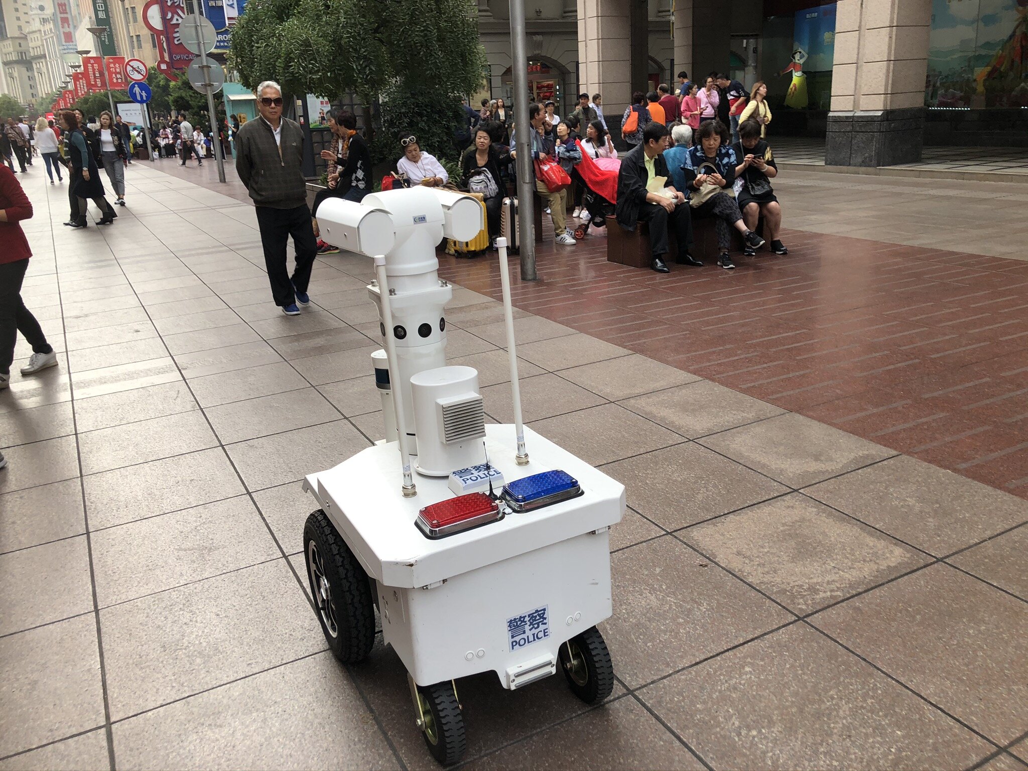  A robotic police patrols the streets 